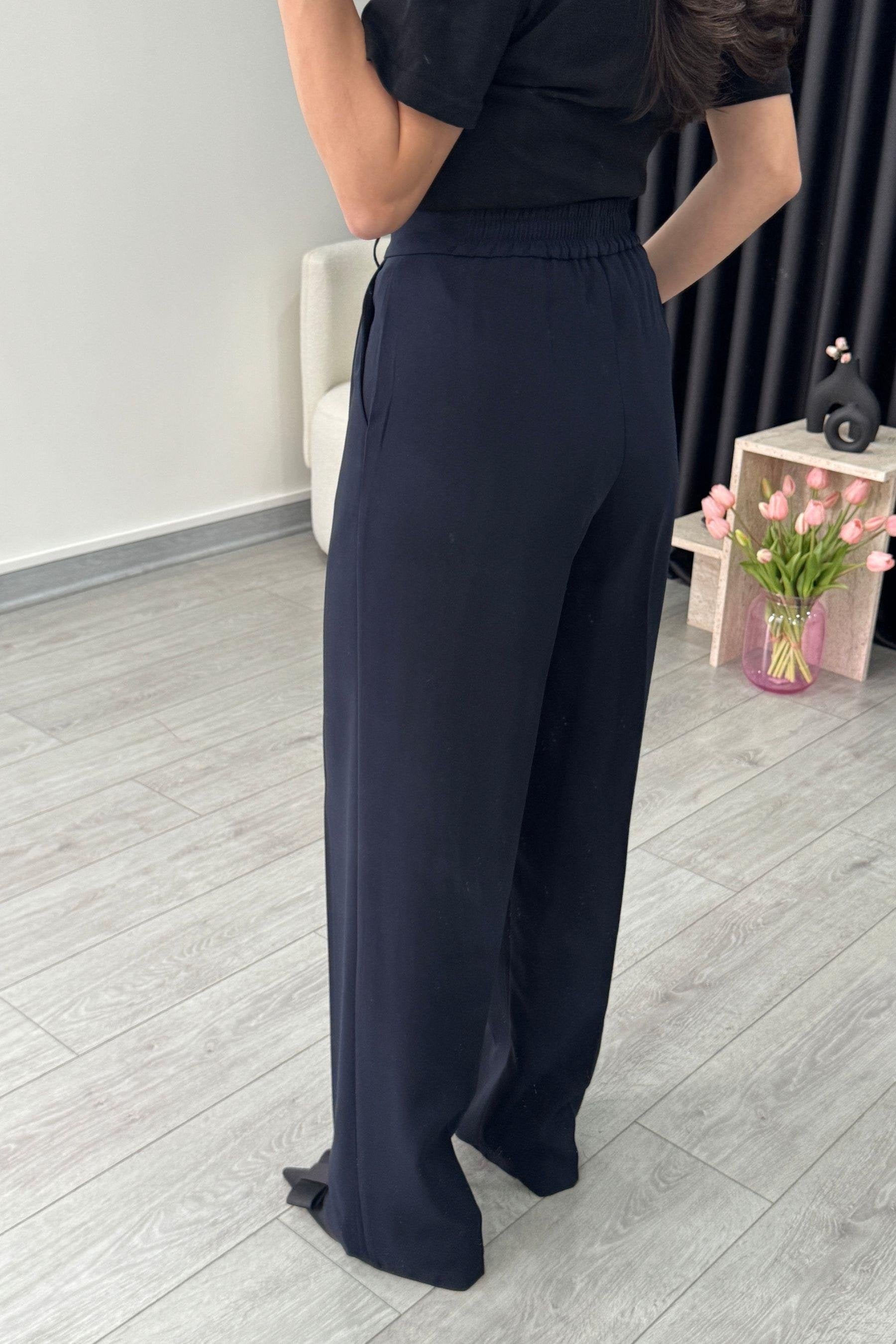 Pantalon Bleu nuit Fluide à bouton doré