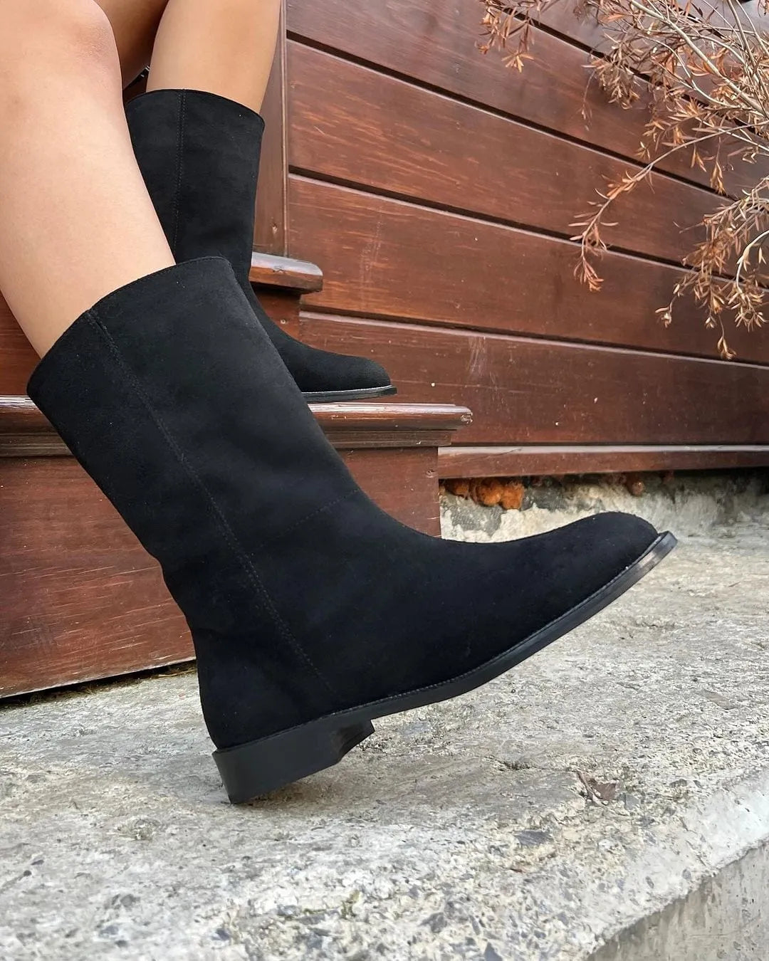 Bottes en suédine noir à semelle plate