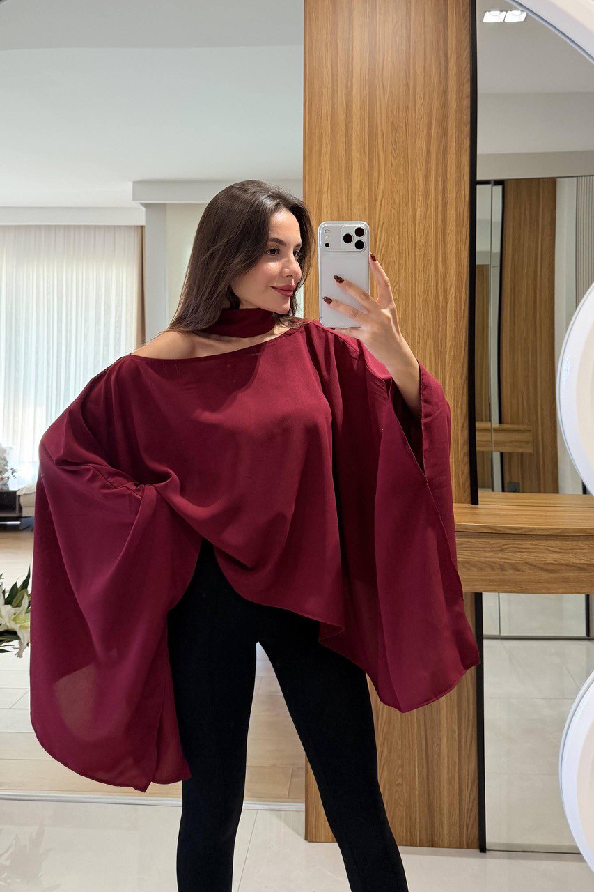  Chemisier cape, blouse fluide, top ample, chemisier asymétrique (si applicable), tunique femme.
Style : Élégant, chic, sophistiqué, moderne, tendance, bohème chic, décontracté chic, tenue de soirée, look professionnel (avec les bons accessoires).