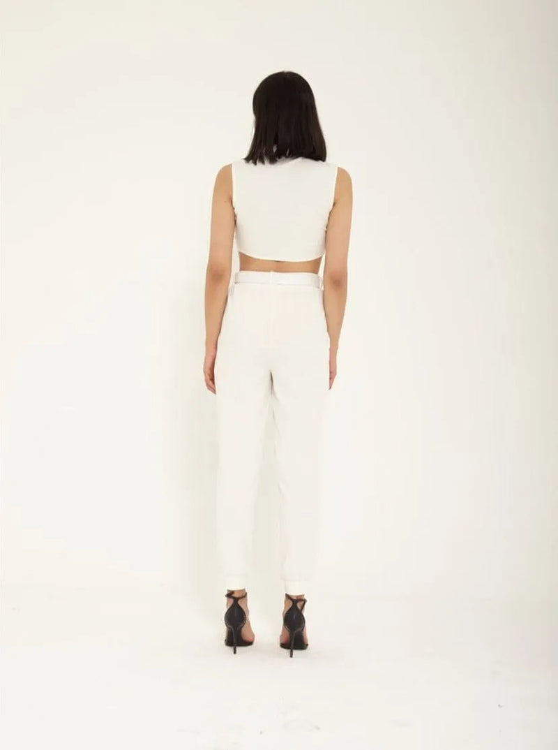 Ensemble pantalon/crop top.